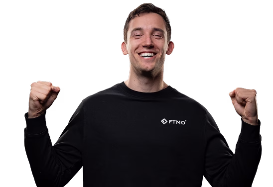 Trader celebrating with raised fists